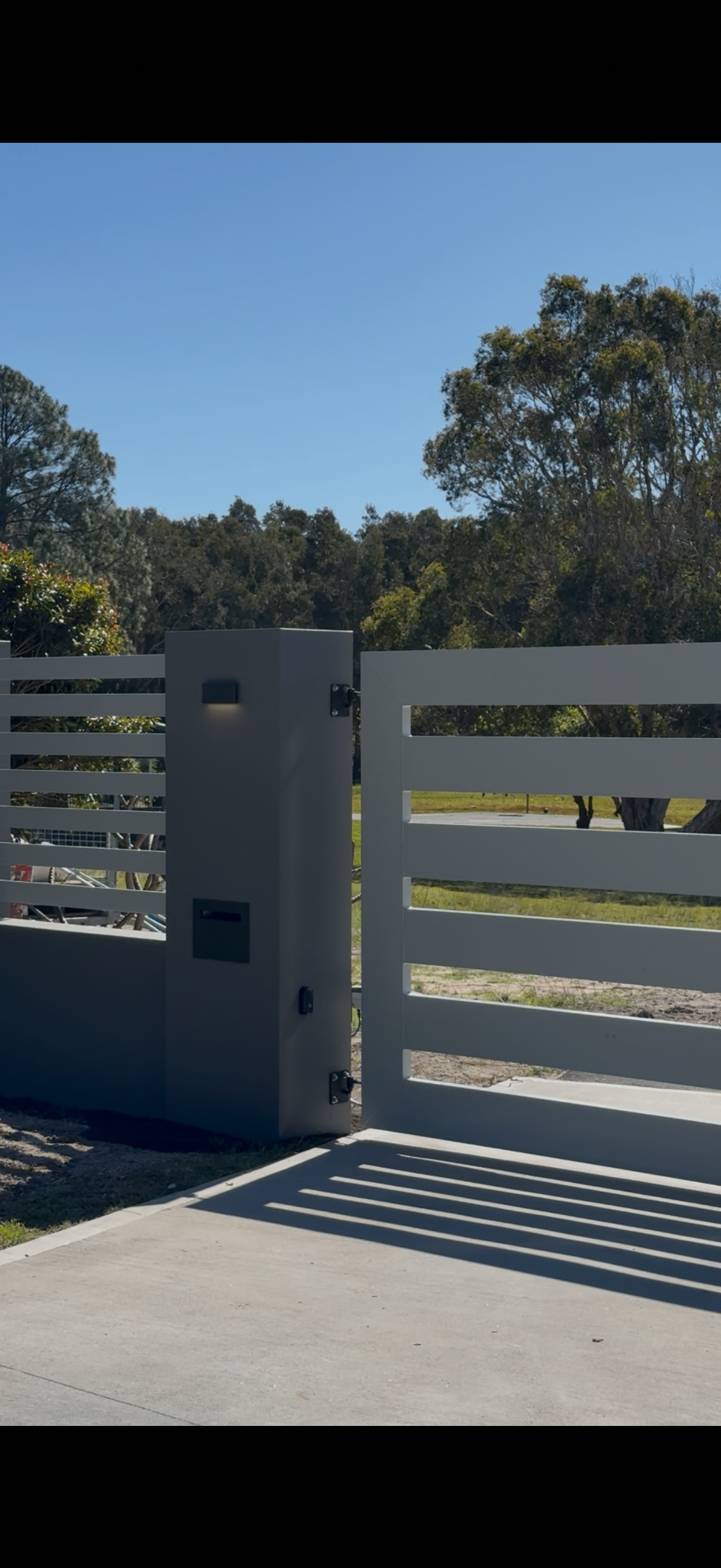 Automated Shale Grey Slat Entry Gate